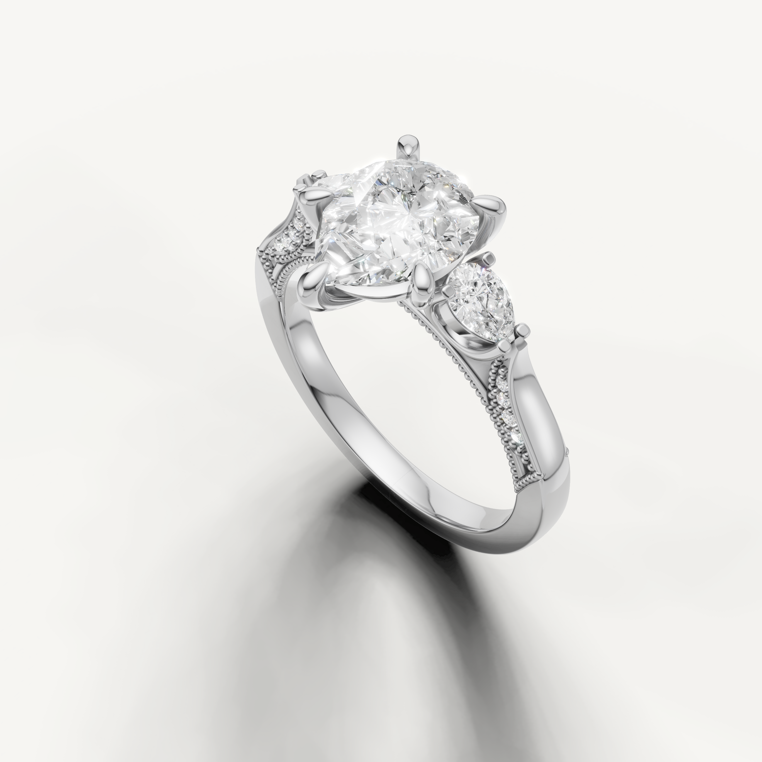 Pear shaped solitaire diamond ring with side pear stones white gold elegant design
