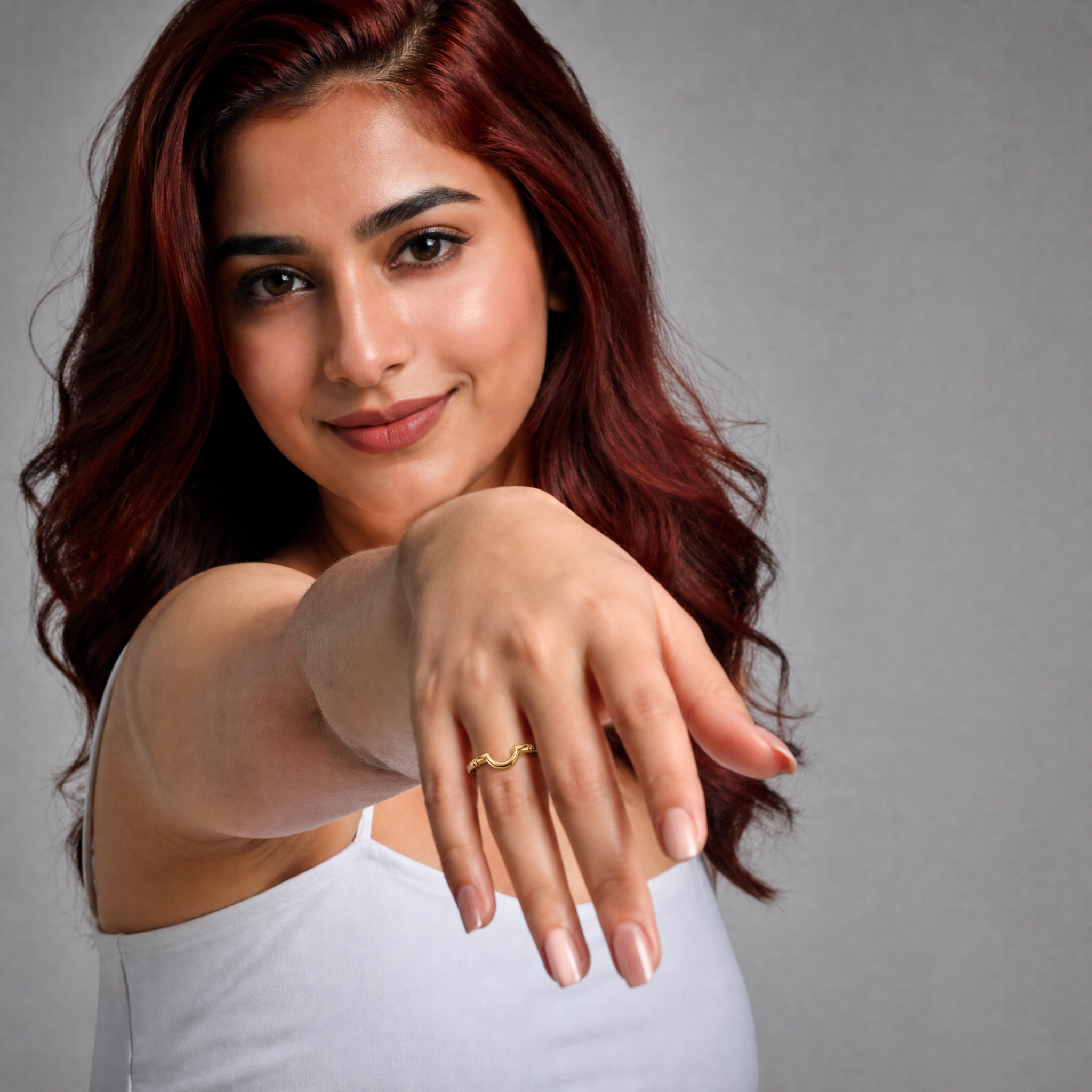 Model wearing Raul Diamonds modern open circle wedding band in polished yellow gold