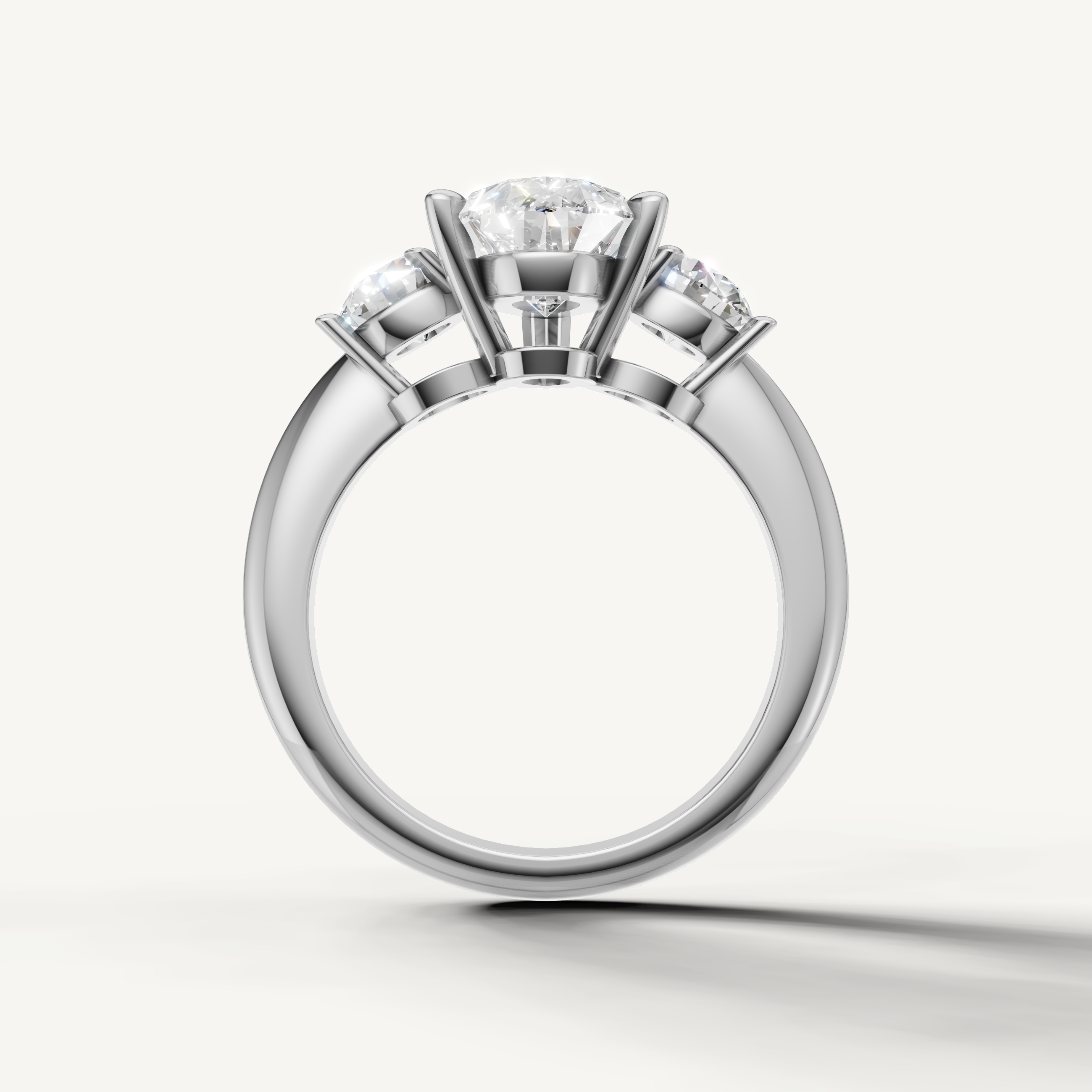 Classic pear diamond engagement ring with round side stones white gold