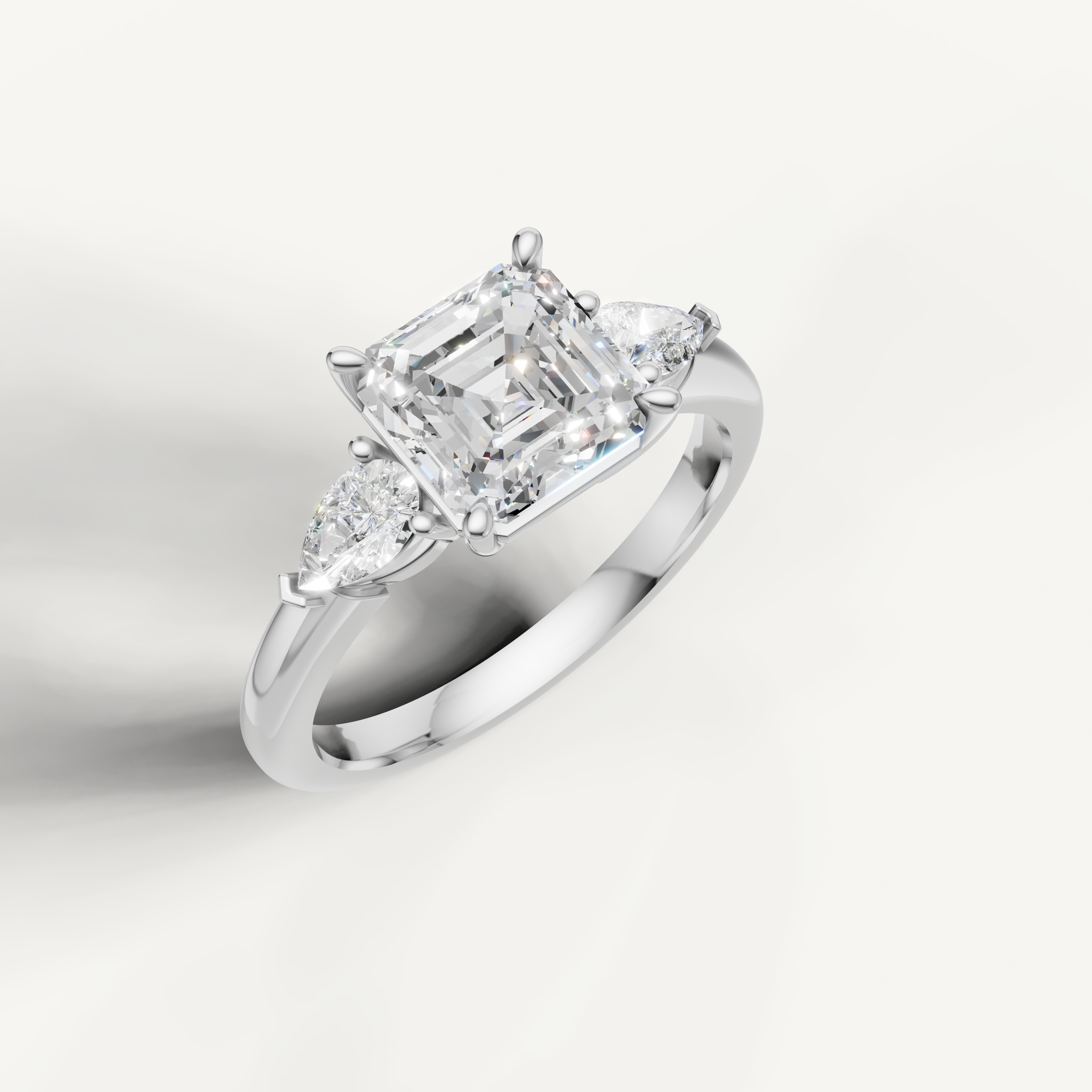 IGI certified asscher lab diamond three stone ring with pear sides 14k white gold