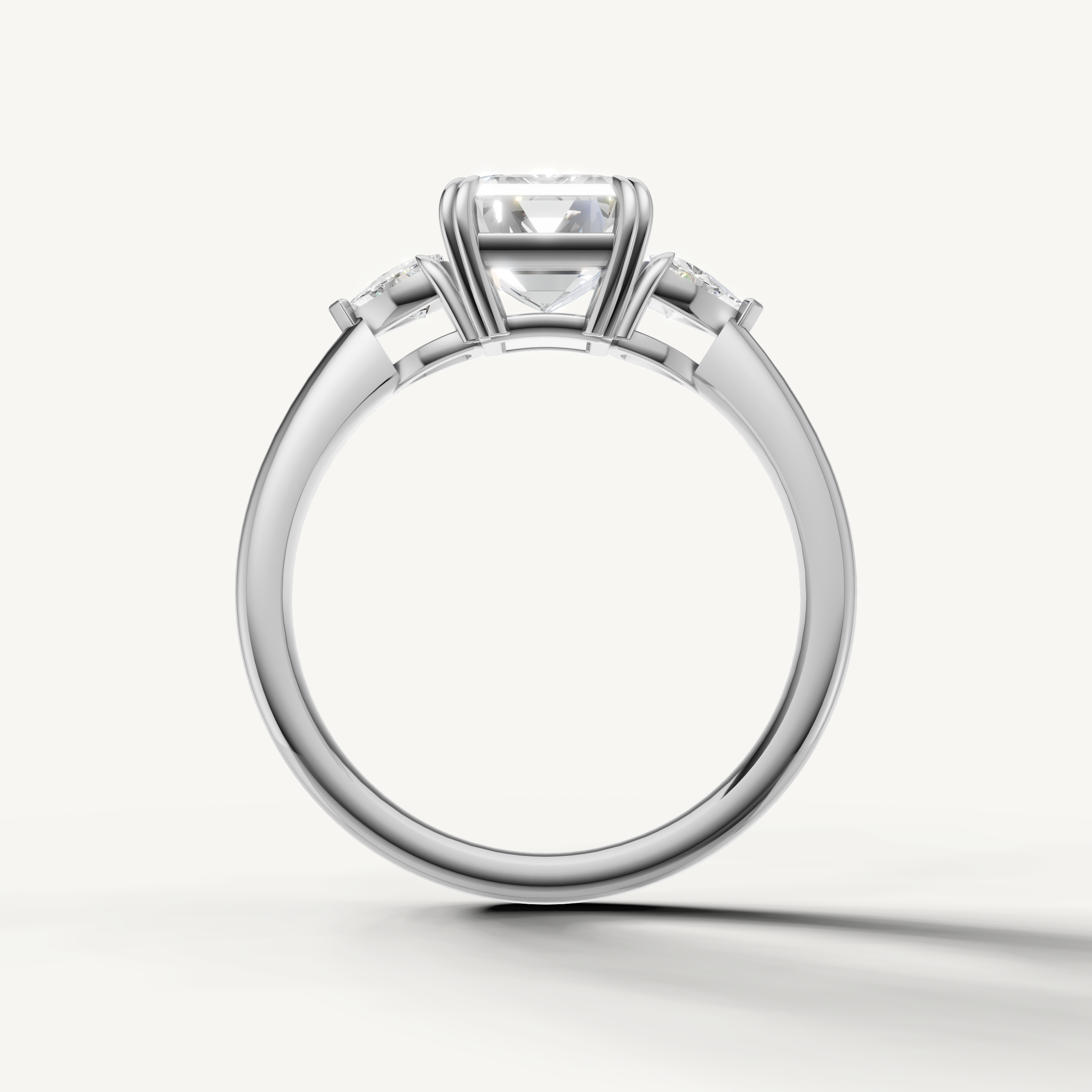 timeless emerald cut lab grown diamond ring with sleek white gold setting and trillion accents