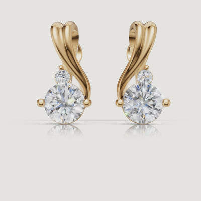 Yellow gold twisted diamond drop earrings cinematic jewelry video by Raul Diamonds
