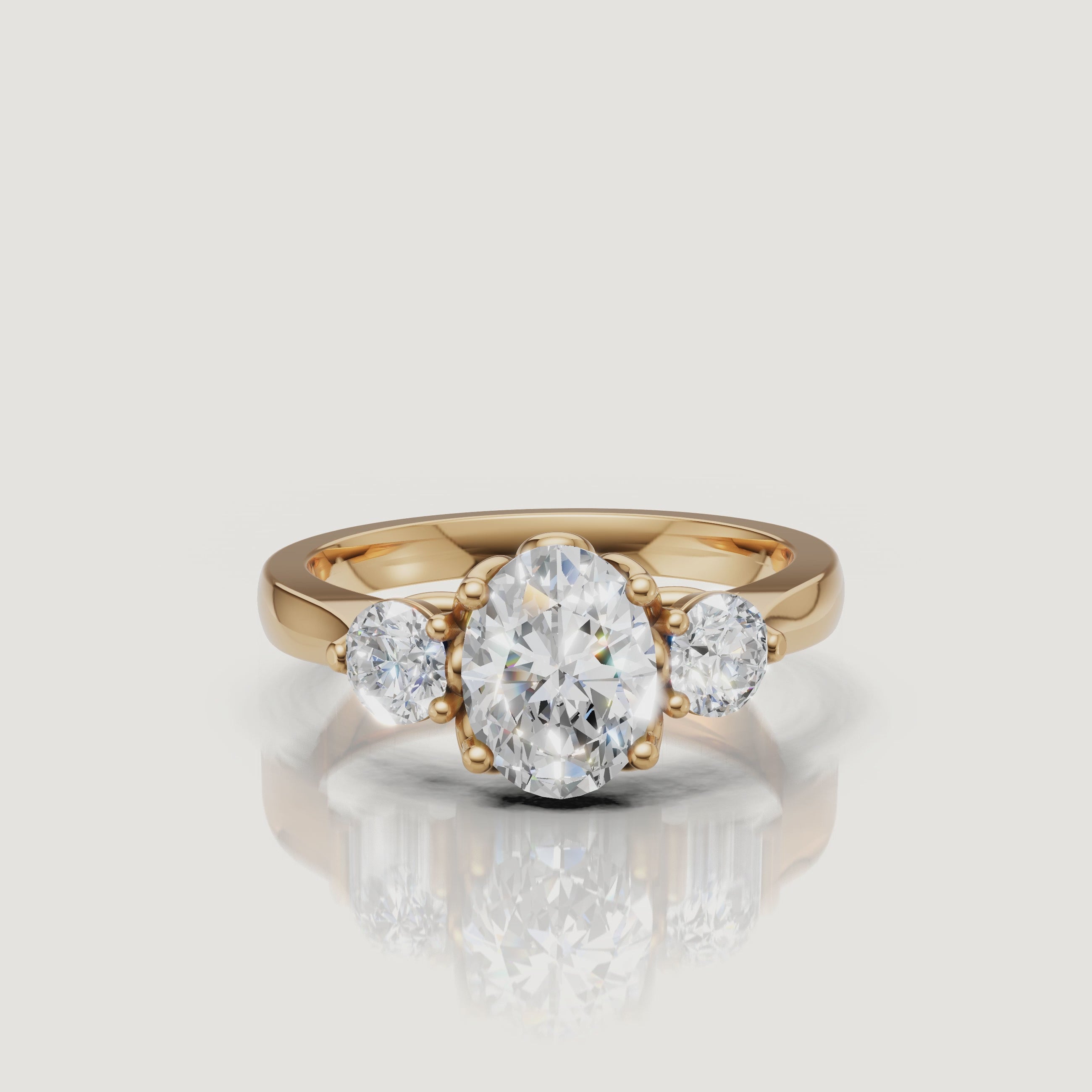 Yellow Gold Video Alt Text: Raul Diamonds oval diamond engagement ring video in yellow gold with side stones