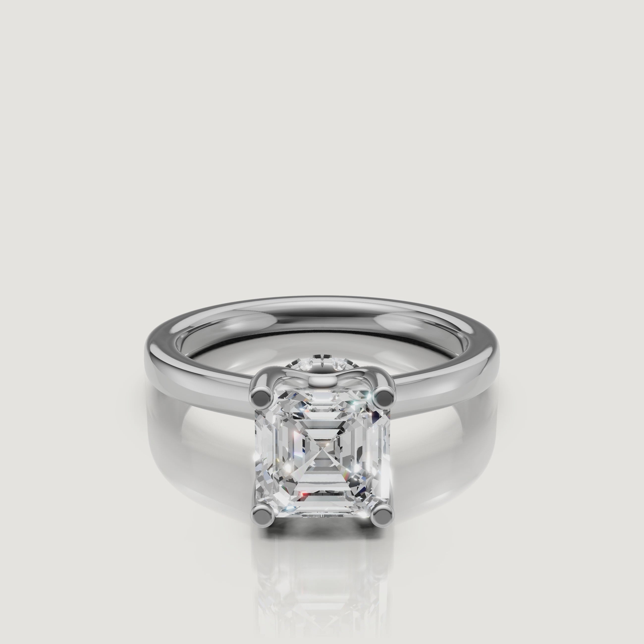 Luxury jewelry video of a Raul Diamonds white gold Asscher solitaire, showcasing the cathedral style band and the secret hidden halo detail