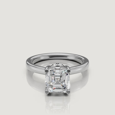 Luxury jewelry video of a Raul Diamonds white gold Asscher solitaire, showcasing the cathedral style band and the secret hidden halo detail