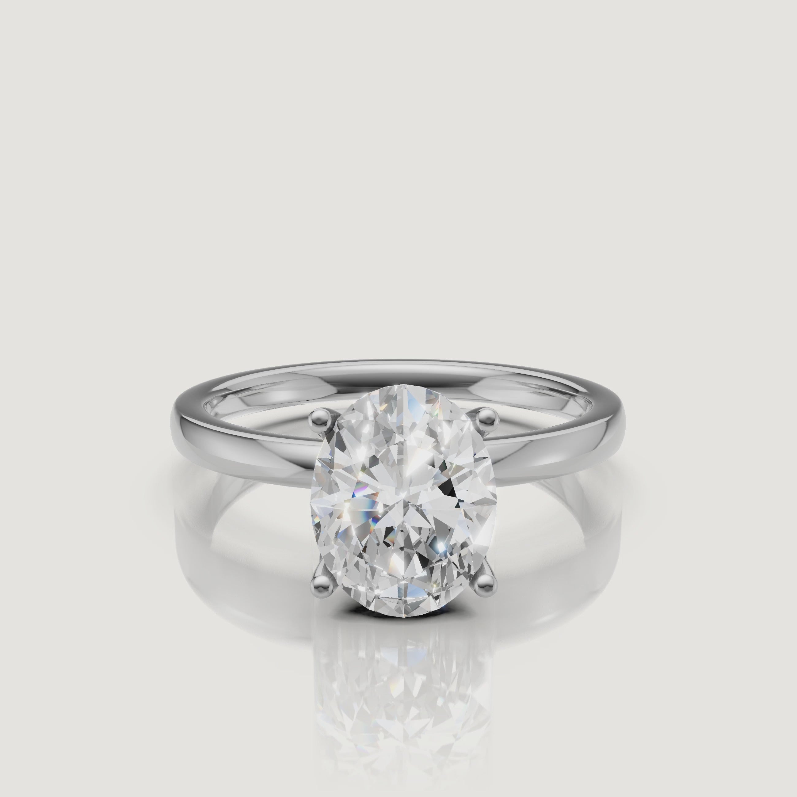 Cinematic video of a white gold oval cut solitaire engagement ring from Raul Diamonds, demonstrating the 'bow-tie' free brilliance and sleek modern band design