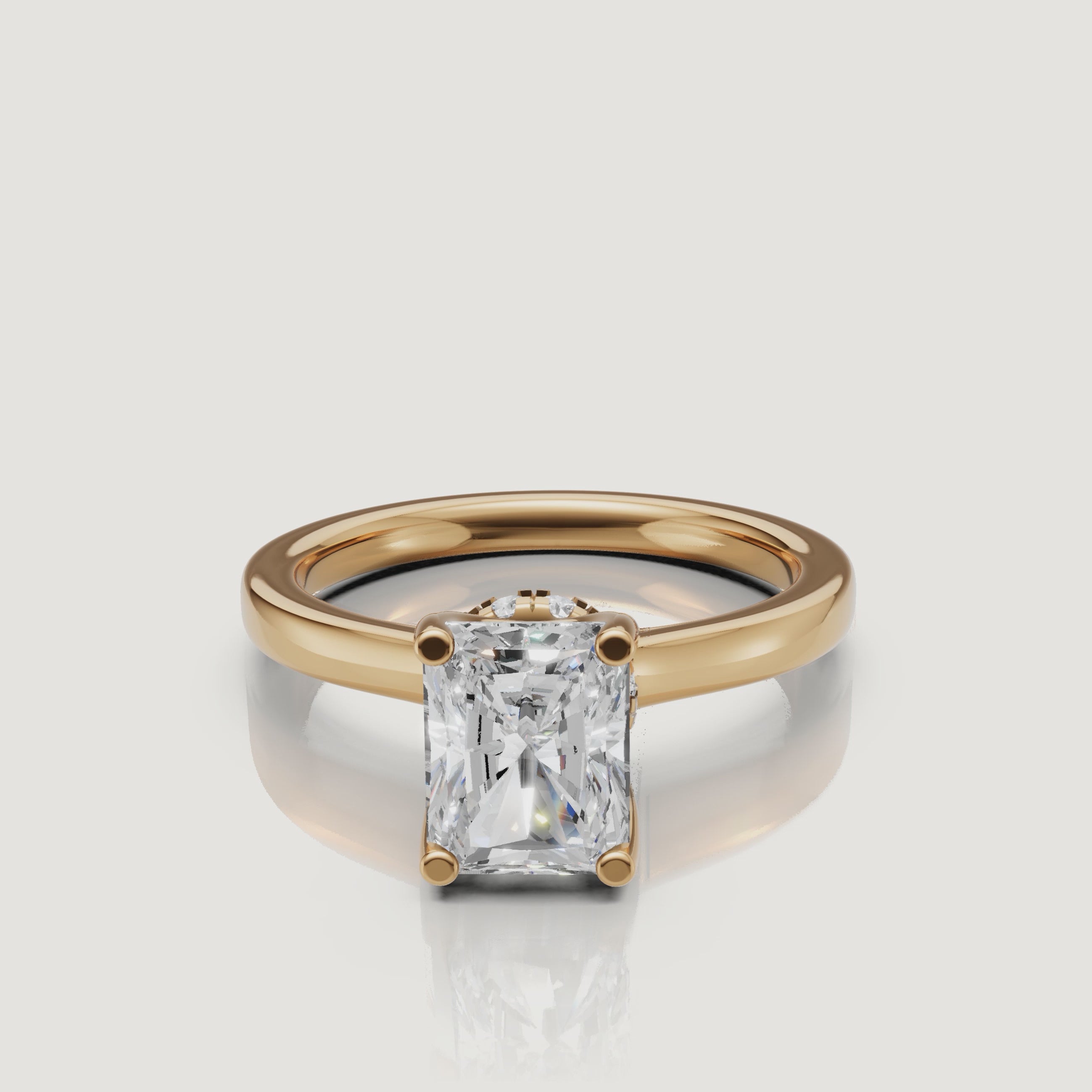 video of radiant cut lab grown diamond solitaire engagement ring in 14k yellow gold