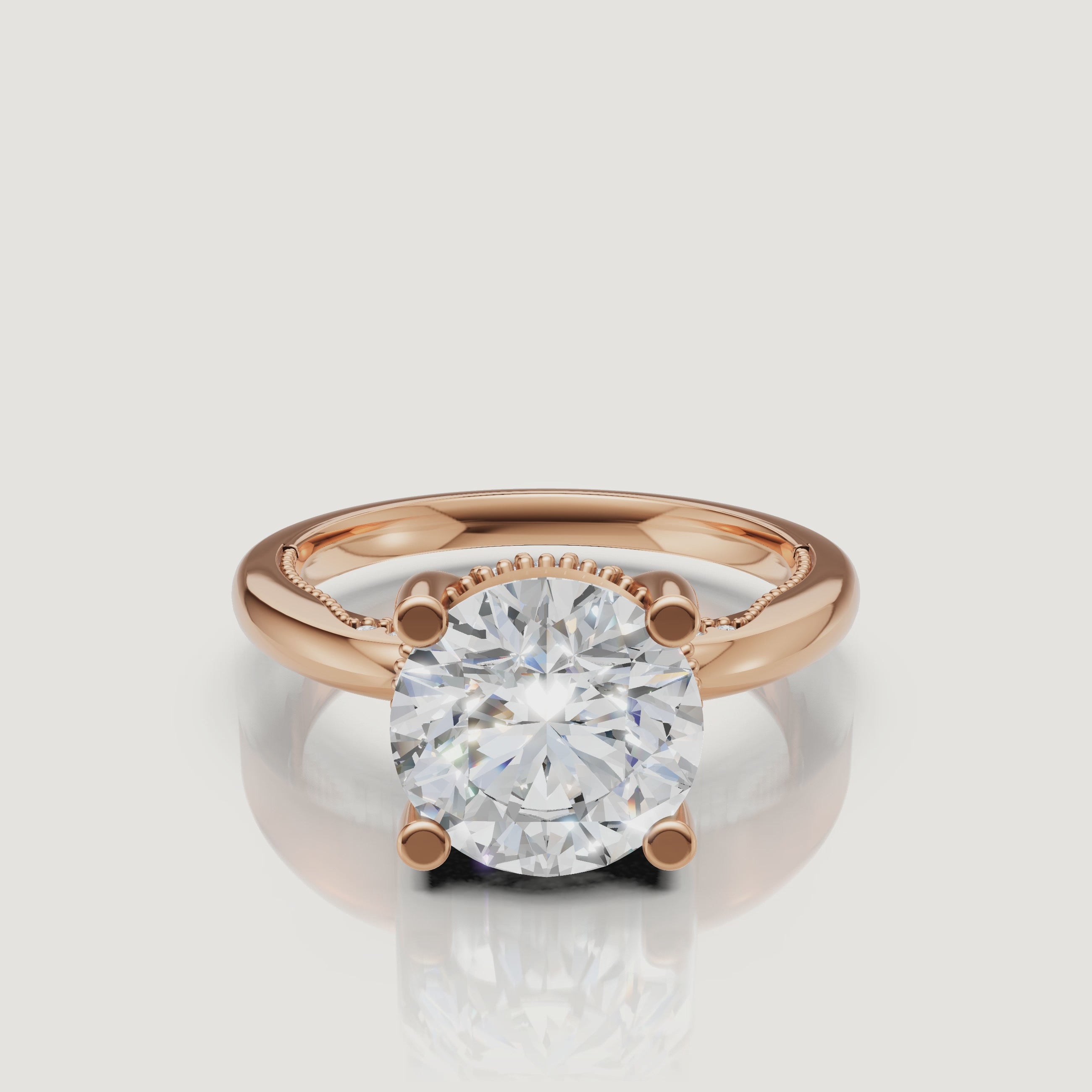 Close-up video of a rose gold round cut diamond ring by Raul Diamonds, capturing the romantic blush metal and the diamond’s exceptional fire.
