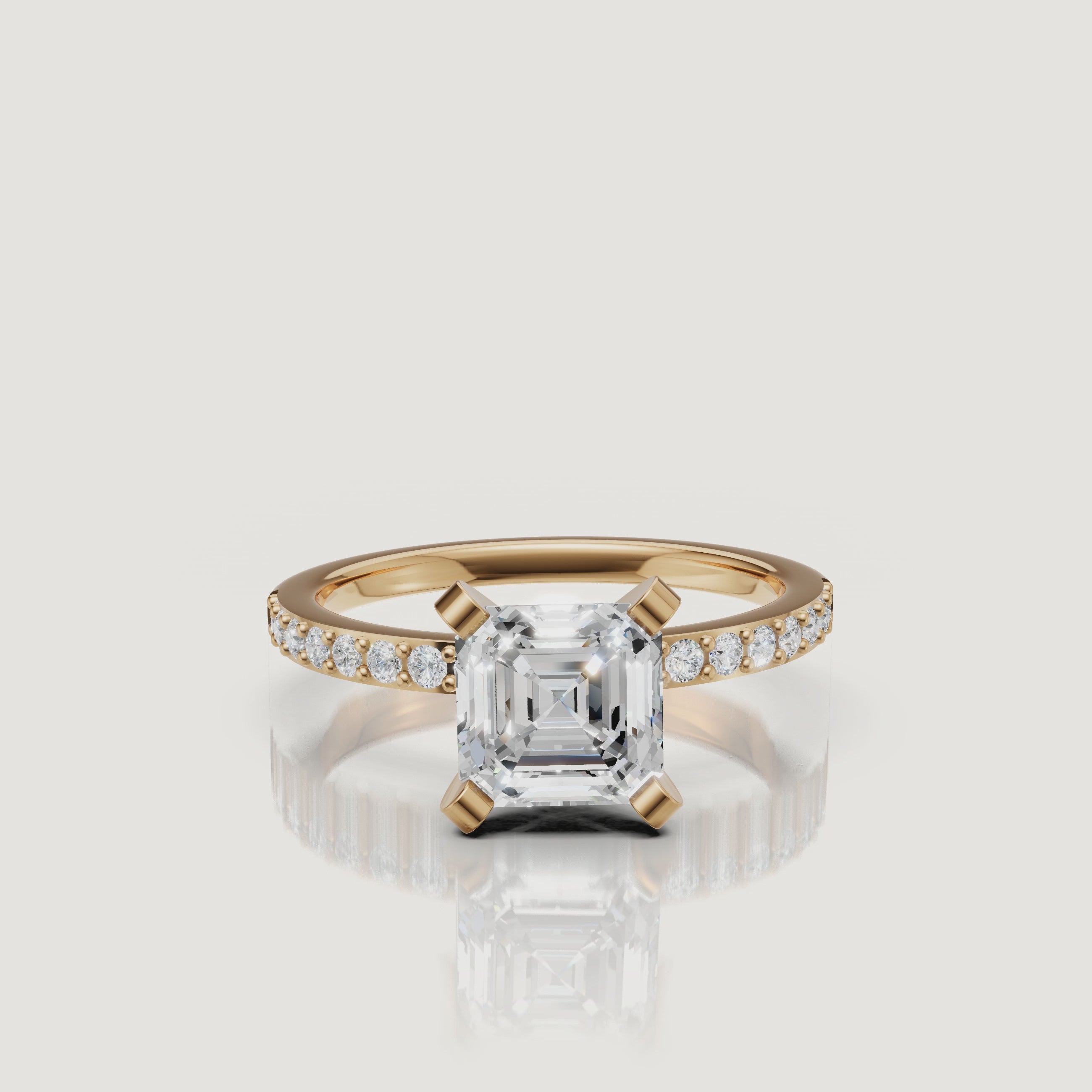 360-degree video of the Raul Diamonds Asscher cut solitaire ring in yellow gold, showcasing the hall-of-mirrors effect of the diamond and the sparkling pavé-set band.