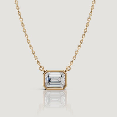 Yellow Gold Emerald Cut Bezel Pendant Necklace Video by Raul Diamonds