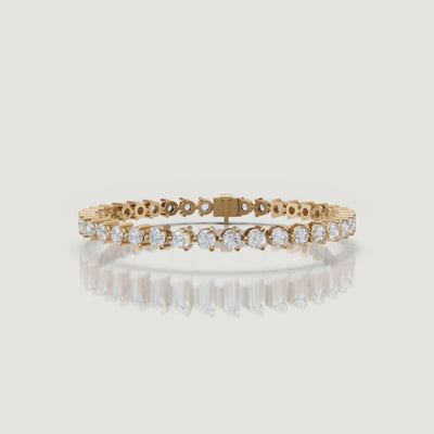 Yellow gold pear and round diamond tennis bracelet video by Raul Diamonds