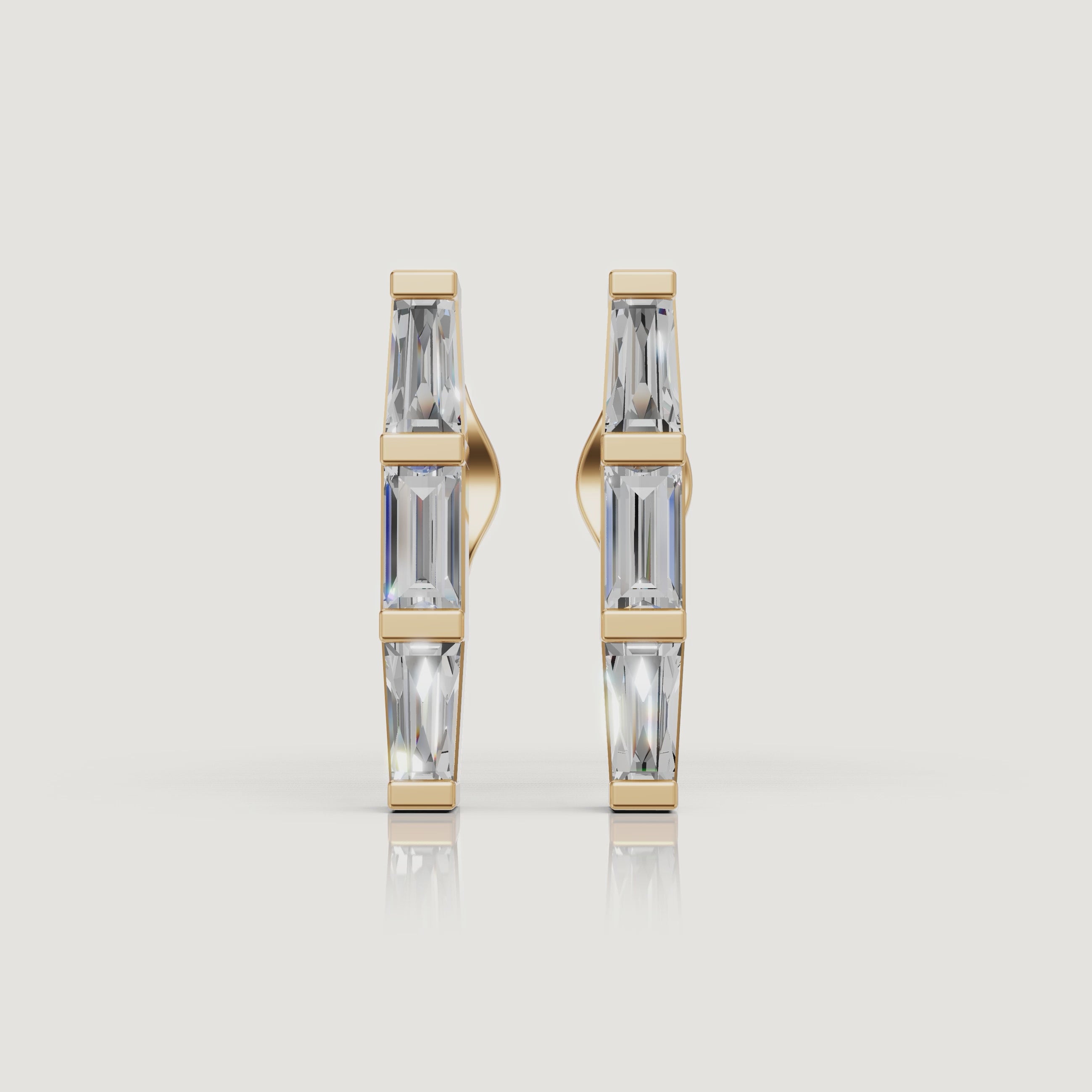 Yellow gold baguette diamond hoop earrings cinematic jewelry video by Raul Diamonds