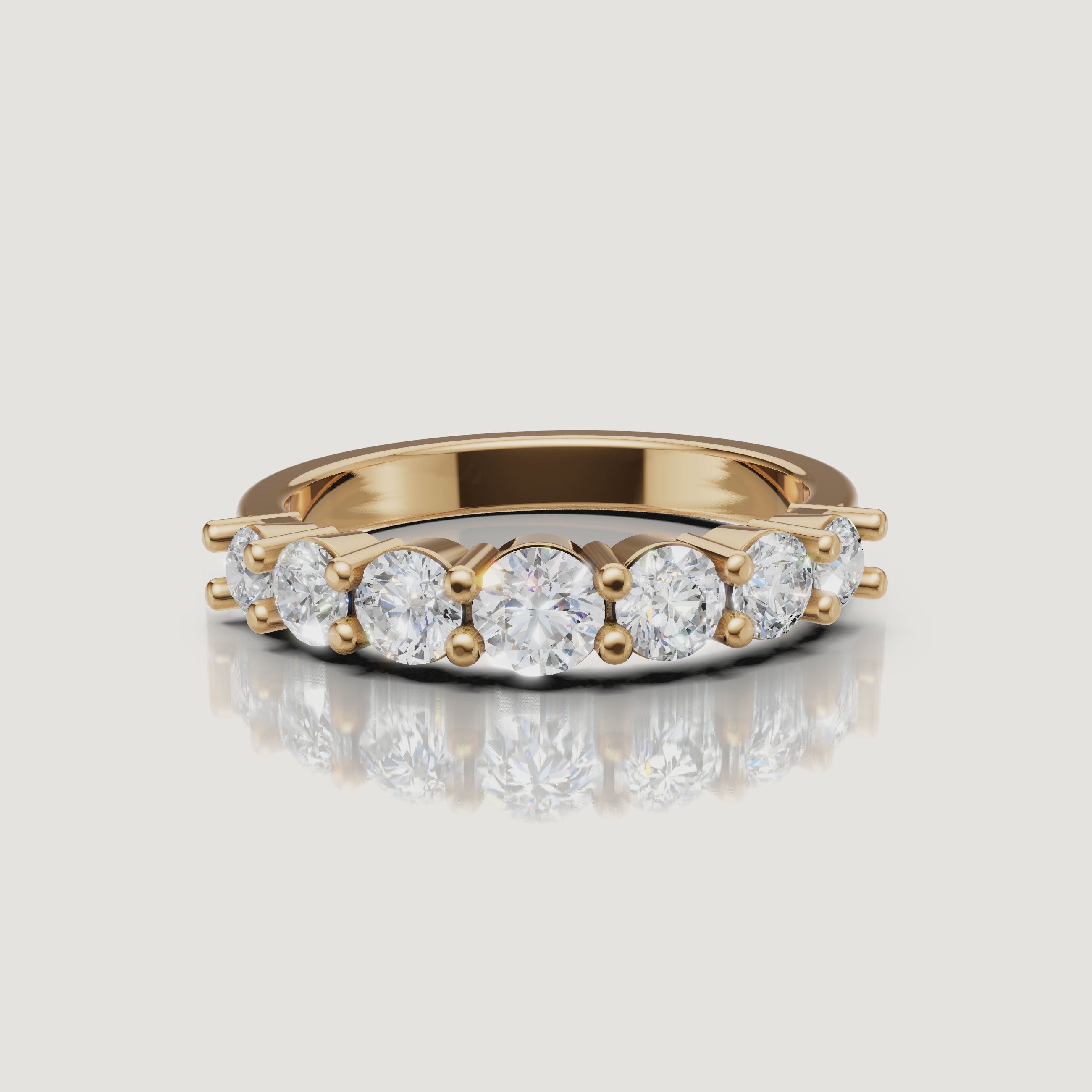 Rotating video of Raul Diamonds yellow gold shared prong wedding band with round diamonds