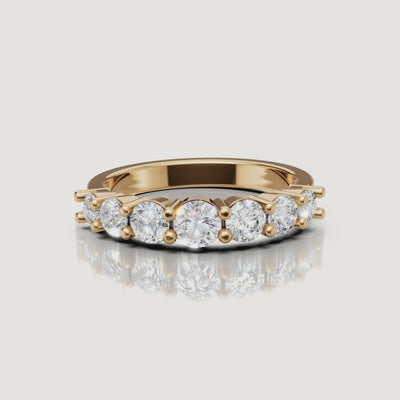 Rotating video of Raul Diamonds yellow gold shared prong wedding band with round diamonds