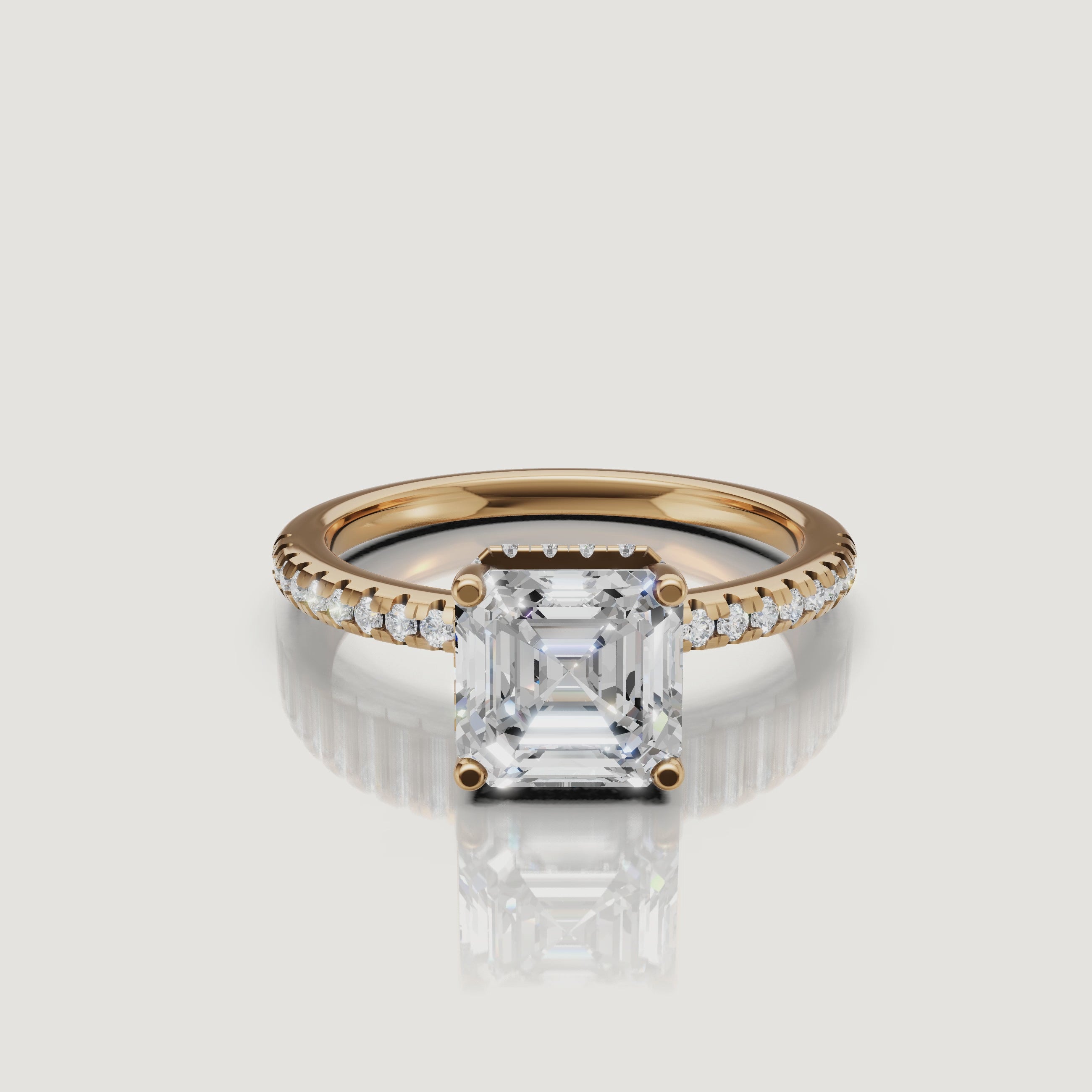 video of asscher cut lab grown diamond pavé engagement ring in 14k yellow gold