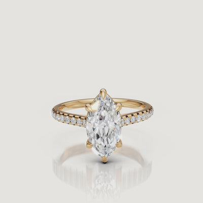 Rotating video of Raul Diamonds marquise cut yellow gold engagement ring with pavé diamond band