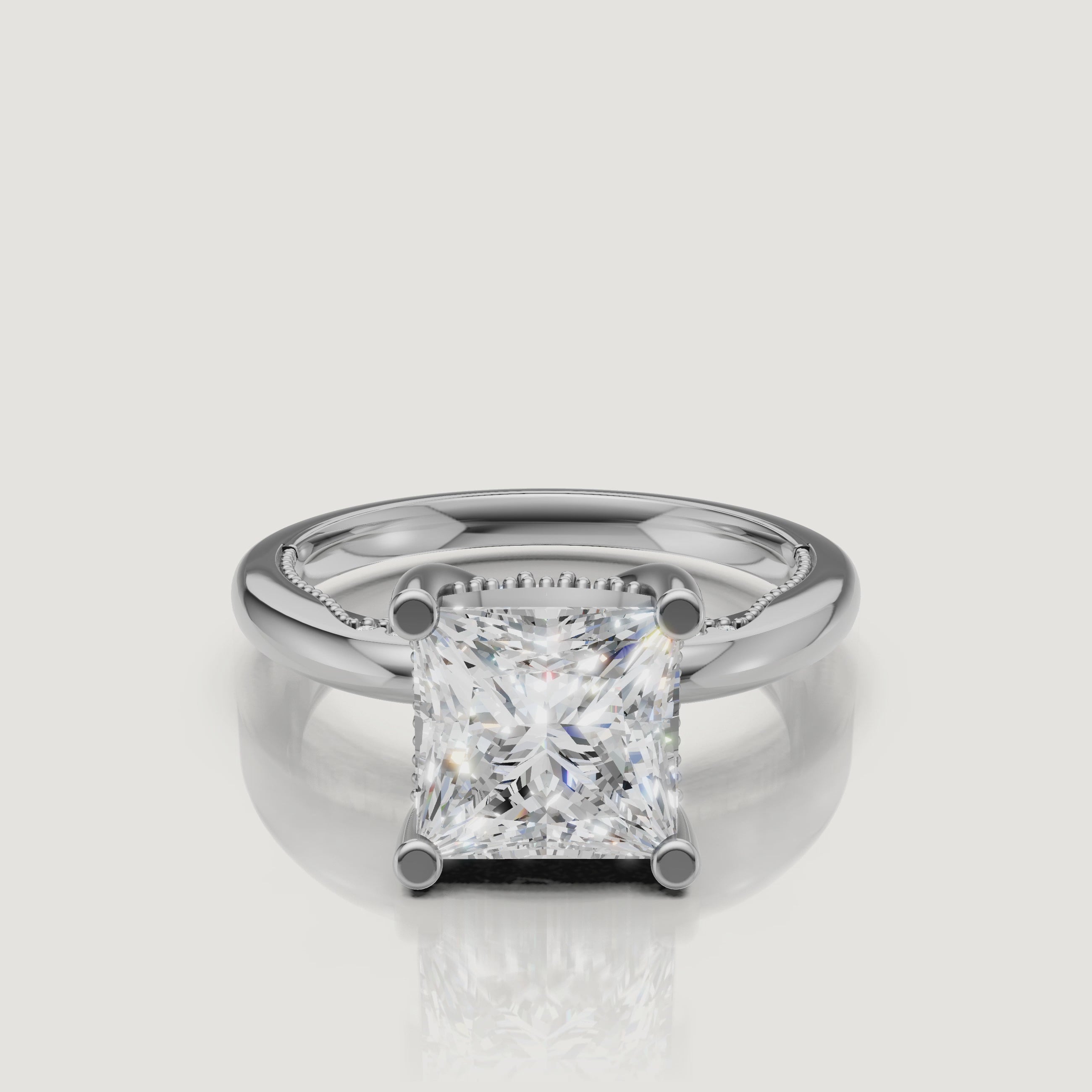 Macro video showcase of a white gold princess cut solitaire ring by Raul Diamonds, displaying the crisp square edges and brilliant white light performance