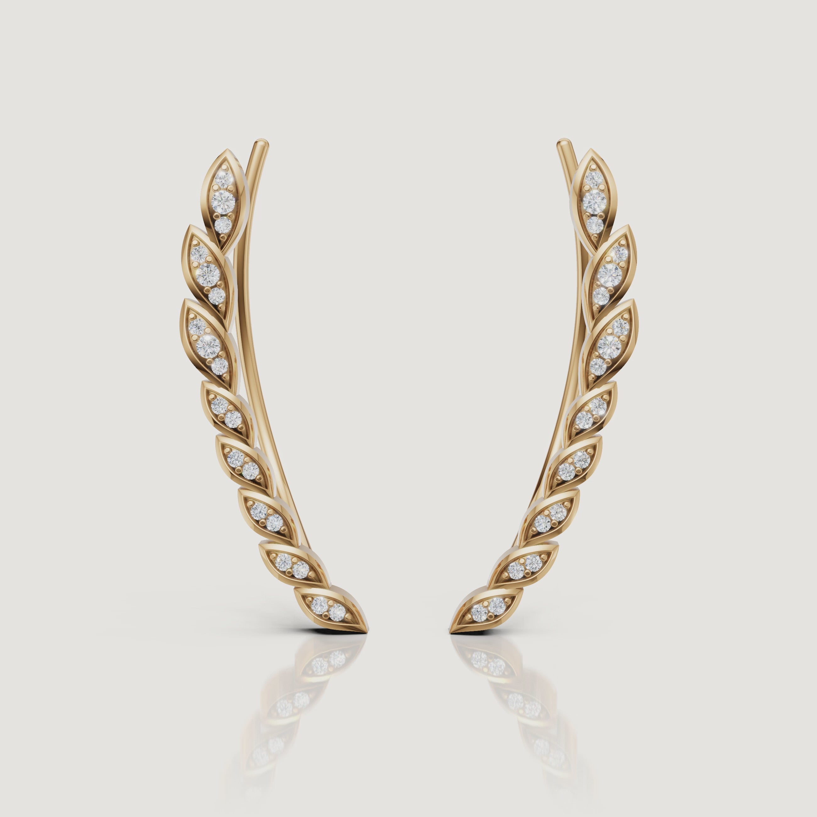 Yellow gold diamond leaf earrings video by Raul Diamonds