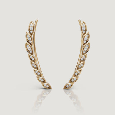 Yellow gold diamond leaf earrings video by Raul Diamonds