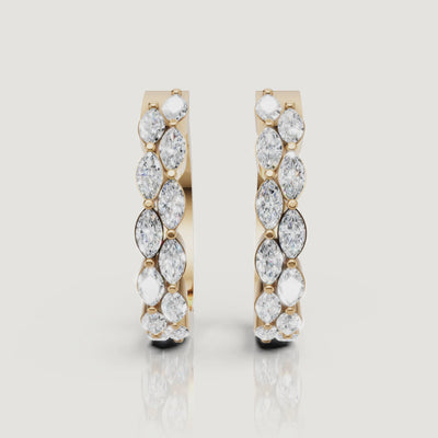 Yellow gold marquise diamond hoop earrings video showcasing brilliant sparkle by Raul Diamonds