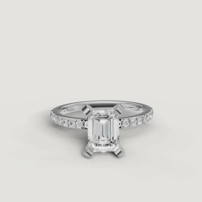 High-definition 360 video of the Raul Diamonds white gold emerald cut engagement ring, focusing on the brilliant light performance and seamless pavé setting.