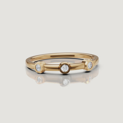 Yellow gold bezel set diamond wedding band video with modern minimalist design by Raul Diamonds