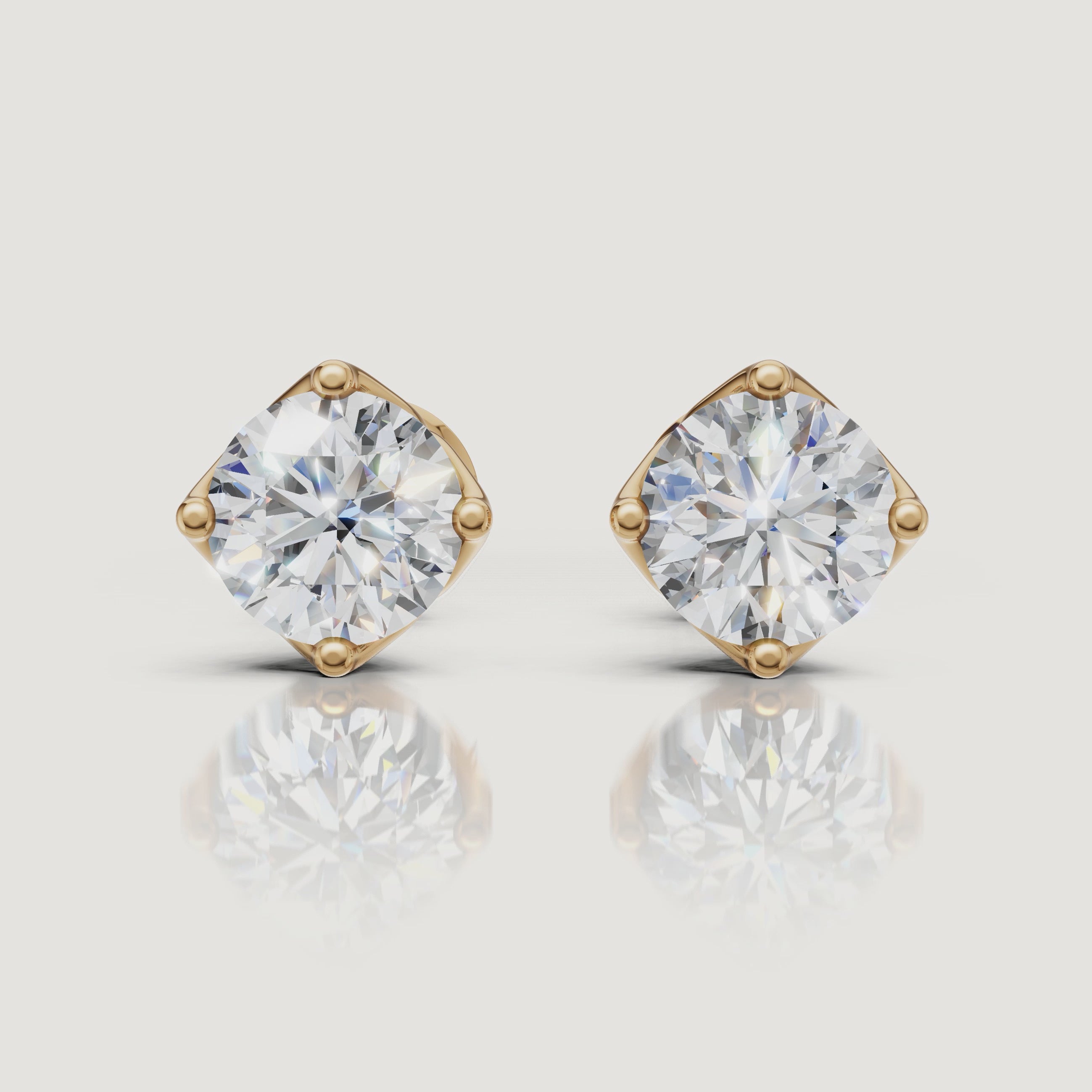 Yellow gold round diamond stud earrings luxury sparkle video by Raul Diamonds