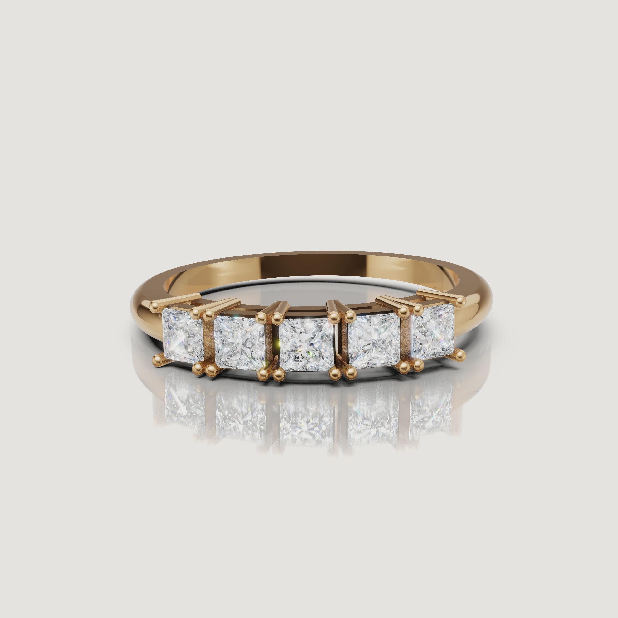 360 rotating video of Raul Diamonds yellow gold princess cut diamond wedding band with five stone design