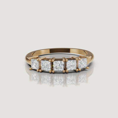 360 rotating video of Raul Diamonds yellow gold princess cut diamond wedding band with five stone design