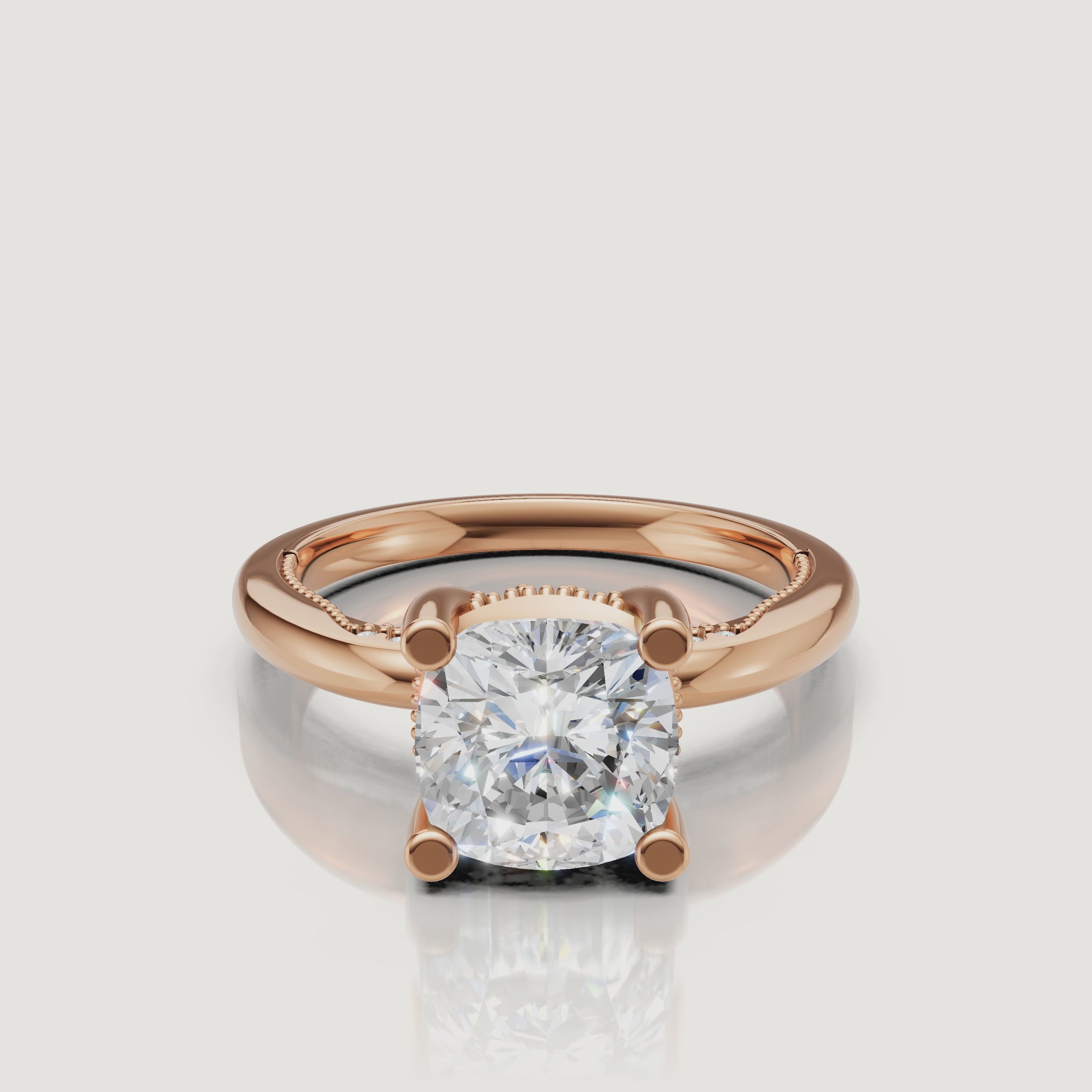 Close-up video of a rose gold cushion cut diamond ring by Raul Diamonds, capturing the warm pink metal tones and crushed-ice brilliance