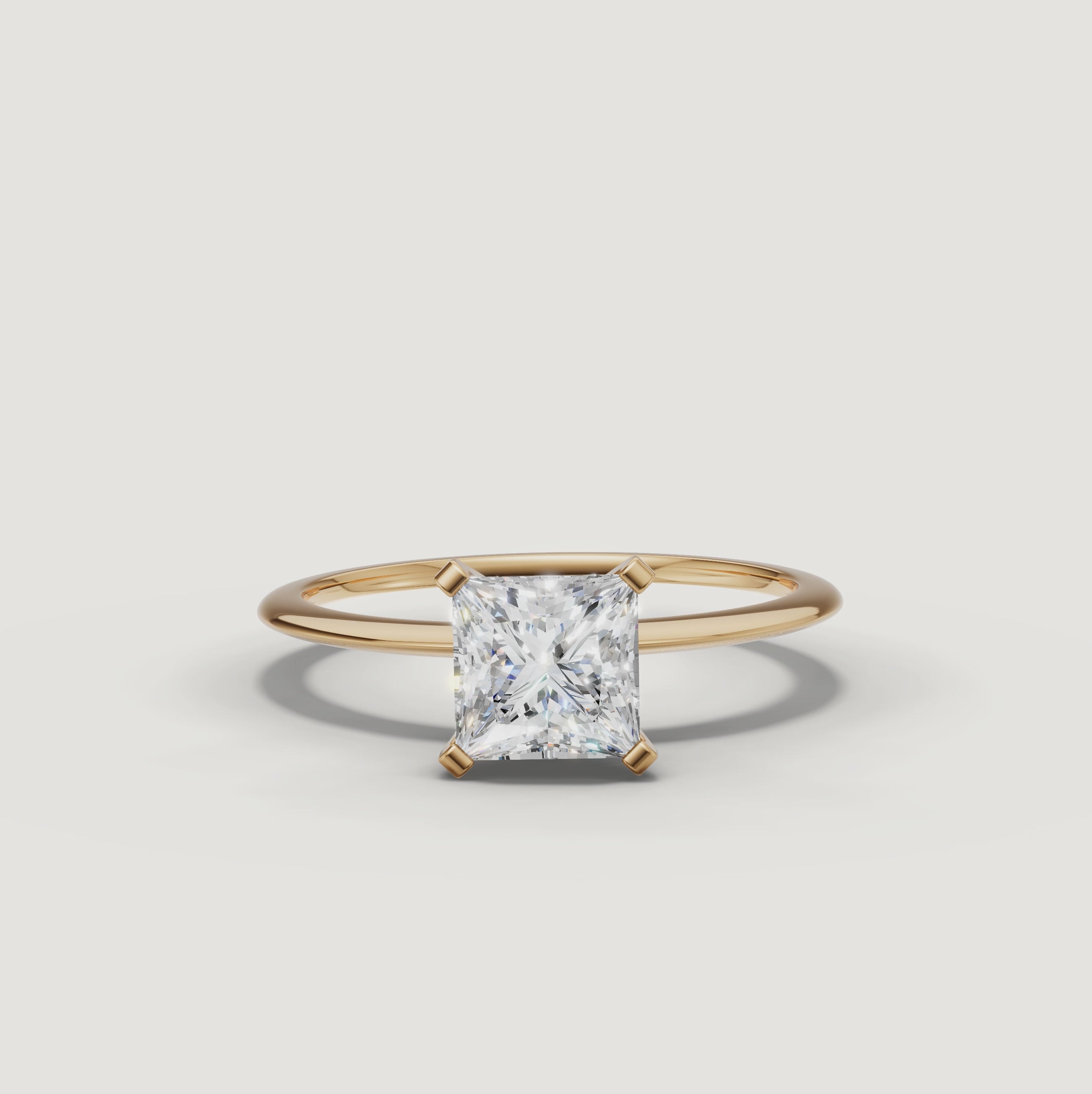 Cinematic video of a princess cut lab grown diamond solitaire engagement ring in yellow gold by Raul Diamonds featuring macro diamond sparkle, elegant hand movement, warm luxury lighting, and premium bridal jewelry styling