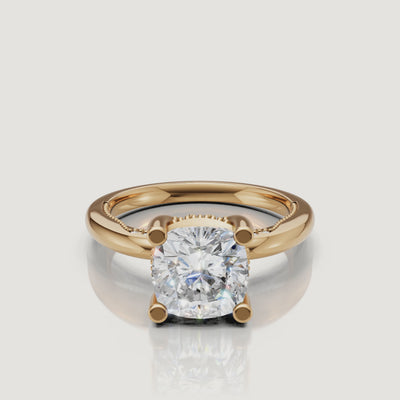 Cinematic 4K video of a Raul Diamonds cushion cut ring in yellow gold, rotating to show the hidden halo and brilliant facet light performance