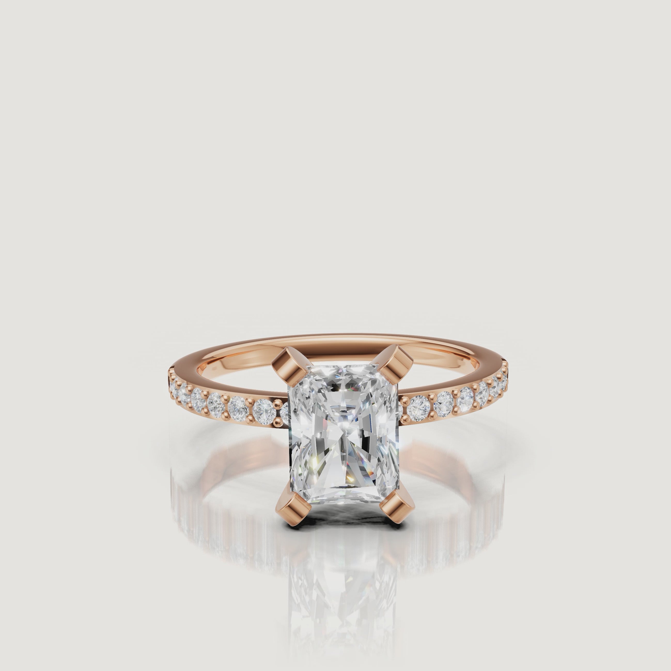 Elongated radiant lab grown diamond engagement ring with pavé band in 14K rose gold by Raul Diamonds video view