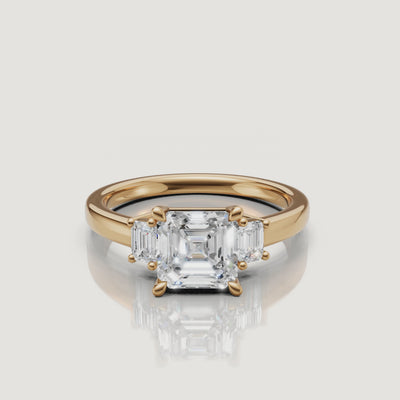 Asscher cut lab grown diamond three stone engagement ring in 14K yellow gold by Raul Diamonds video showcase