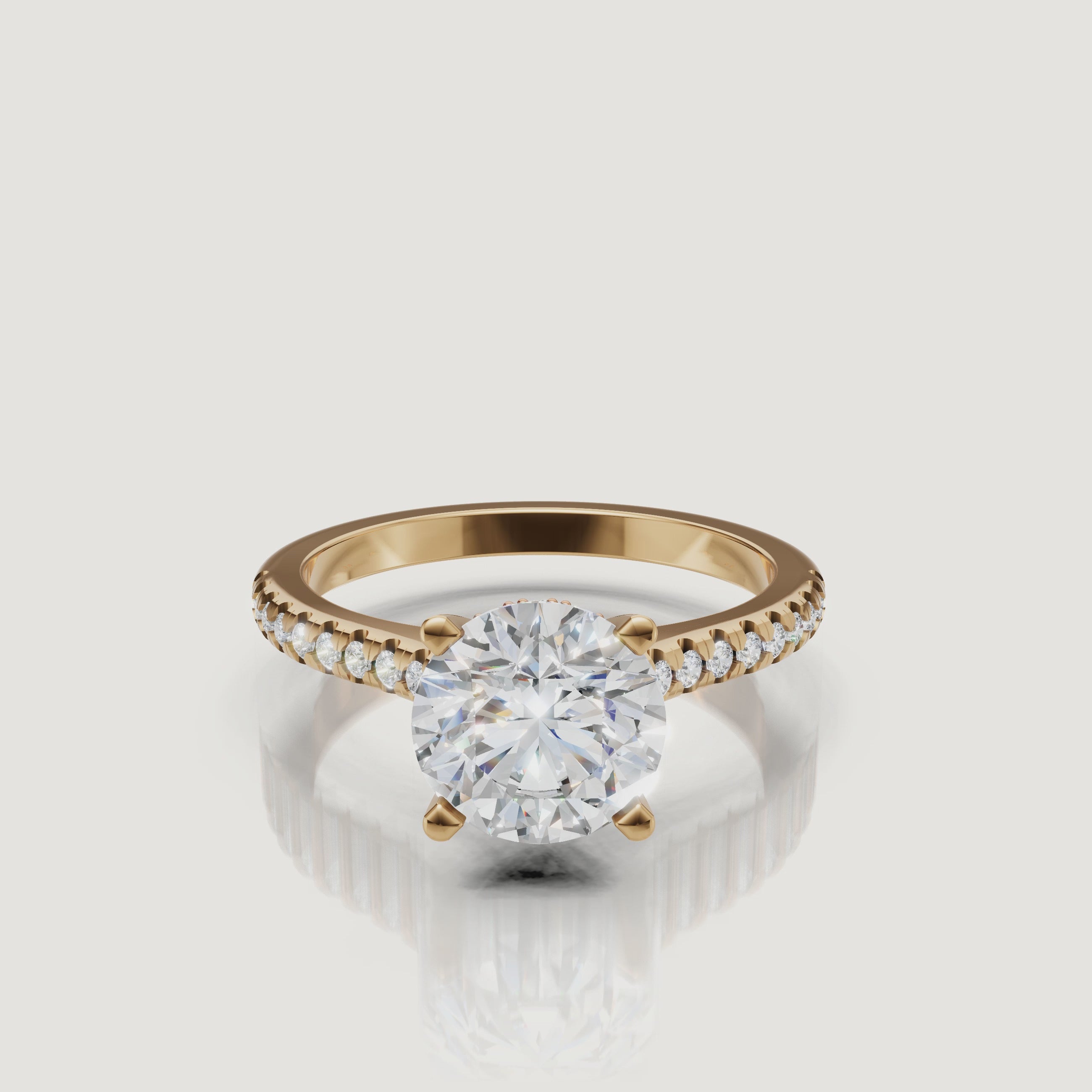 360 view of round cut lab grown diamond pavé engagement ring in 14K yellow gold by Raul Diamonds