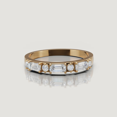 Raul Diamonds yellow gold emerald and round diamond wedding band rotating video with luxury sparkle
