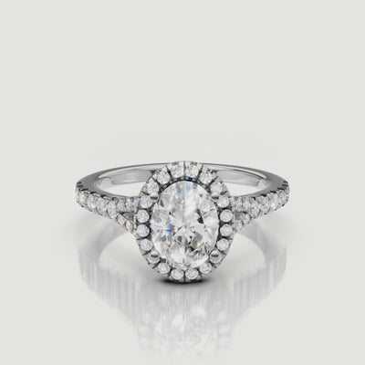 High-definition video of a white gold oval cut diamond ring with a pavé halo, demonstrating the superior brilliance and fire of the Raul Diamonds center stone