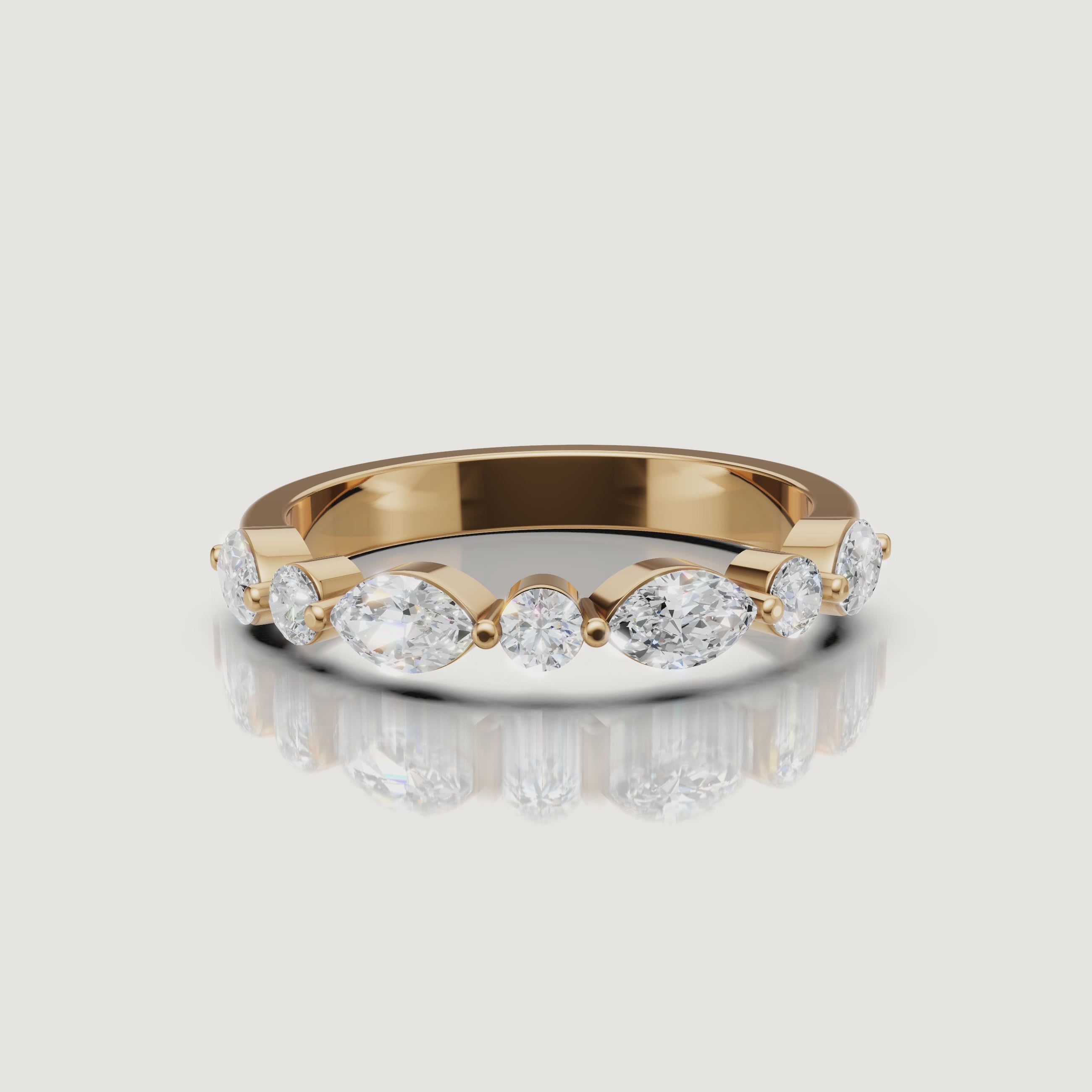 Raul Diamonds yellow gold wedding band video featuring pear and round cut sparkling lab grown diamonds