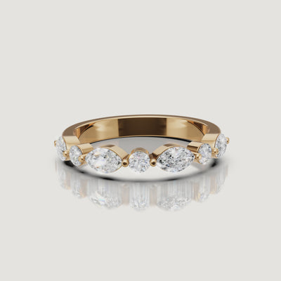 Raul Diamonds yellow gold wedding band video featuring pear and round cut sparkling lab grown diamonds