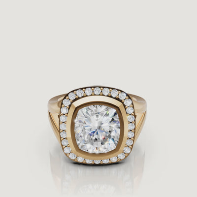 360 video of Raul Diamonds yellow gold pear diamond halo engagement ring with sparkling center stone.