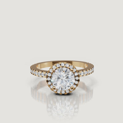 360 video of Raul Diamonds round halo engagement ring in yellow gold with pavé diamond band.