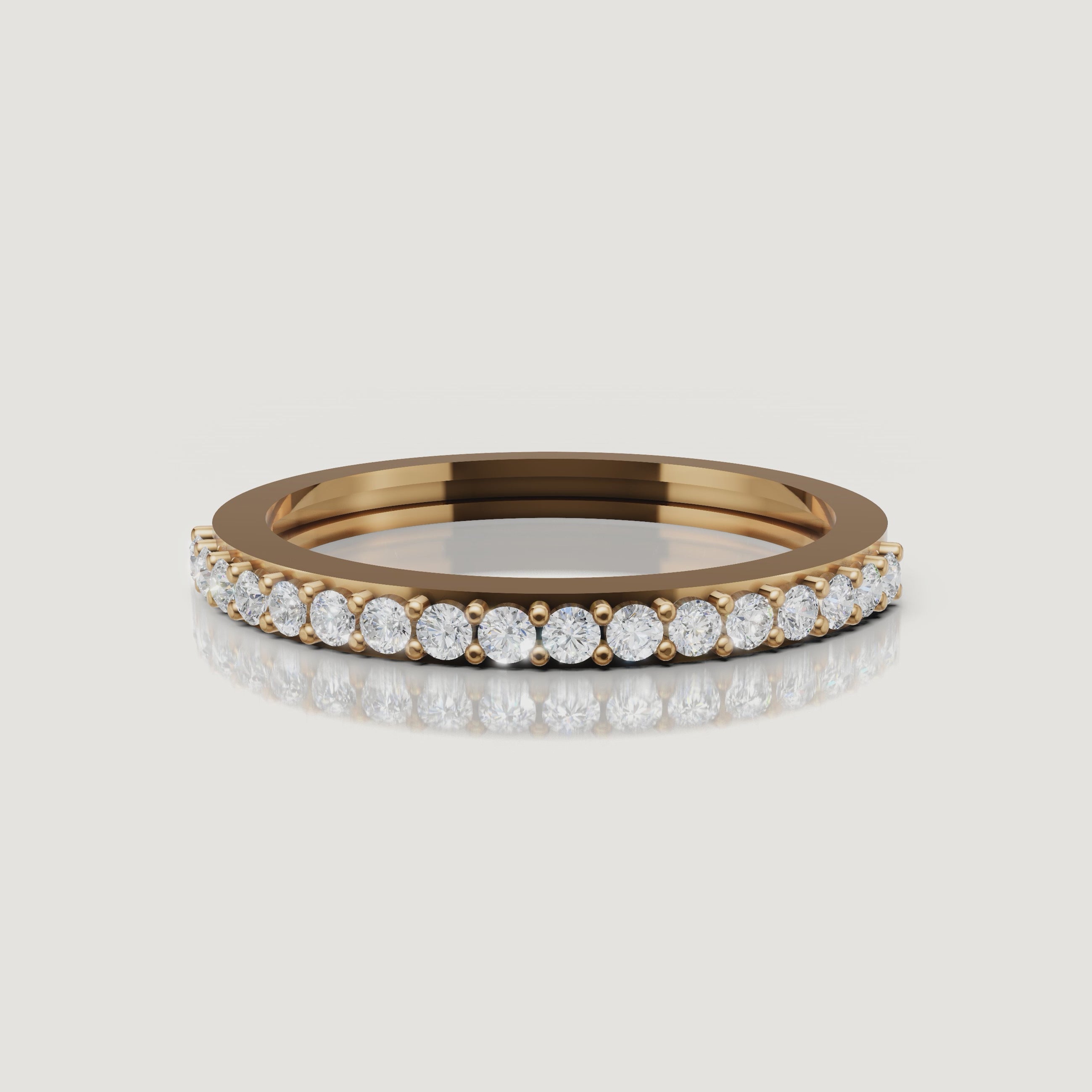 Yellow gold slim diamond eternity wedding band video by Raul Diamonds with round brilliant diamonds
