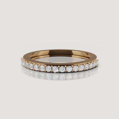Yellow gold slim diamond eternity wedding band video by Raul Diamonds with round brilliant diamonds