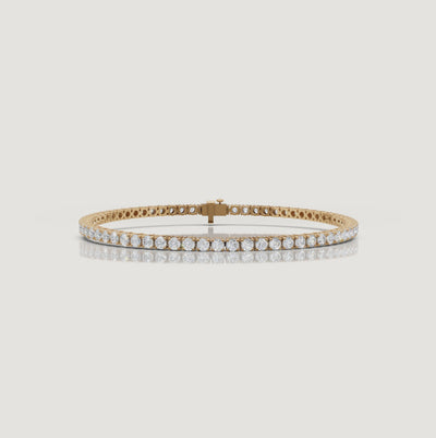 Cinematic video of a 4 carat lab grown diamond tennis bracelet in yellow gold by Raul Diamonds featuring macro diamond sparkle, graceful wrist movement, warm luxury lighting, and timeless fine jewelry elegance for modern women.