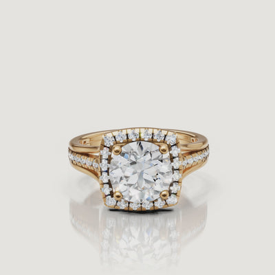 360 video of Raul Diamonds round halo engagement ring in yellow gold with split shank design.