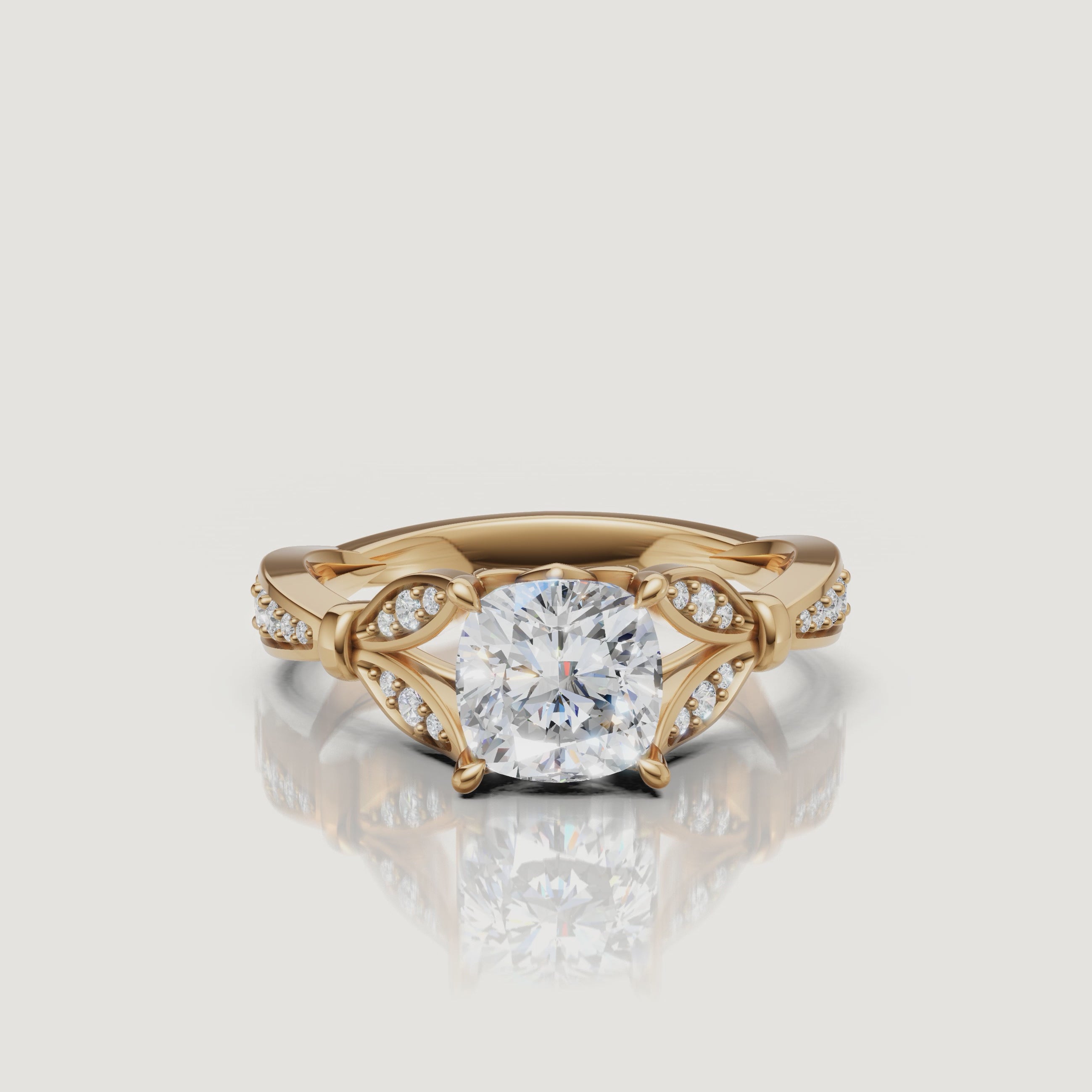 Rotating video of Raul Diamonds cushion cut lab grown diamond engagement ring in 14K yellow gold with pavé accents