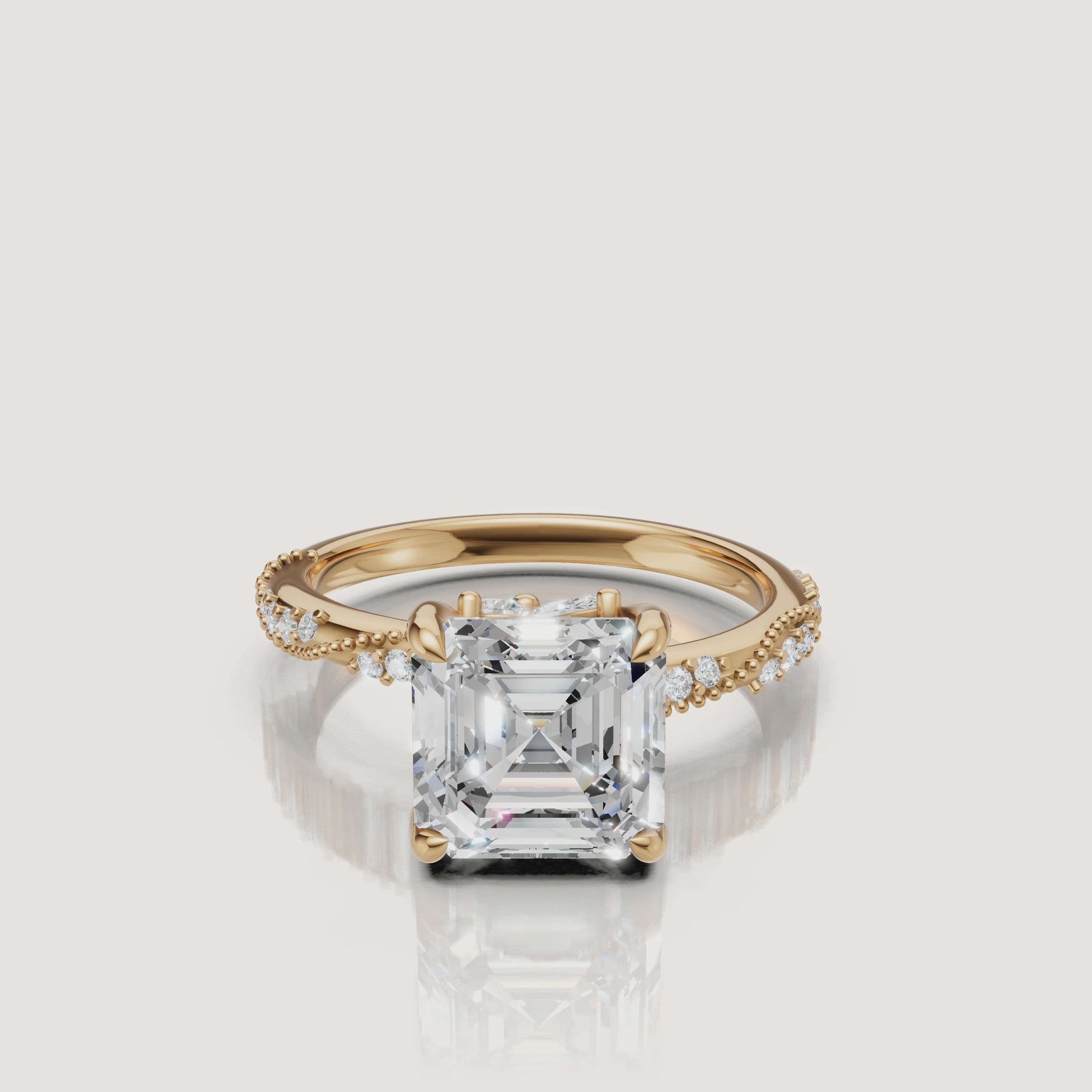14K yellow gold asscher cut lab grown diamond engagement ring with twisted pavé band sparkling from every angle by Raul Diamonds