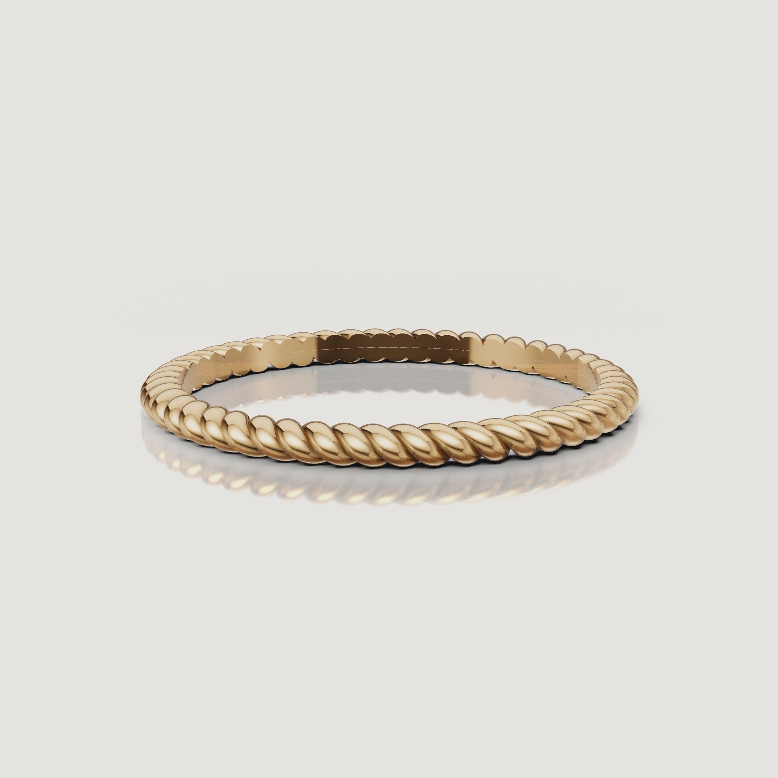 Yellow gold twisted rope wedding band video with polished braided texture by Raul Diamonds