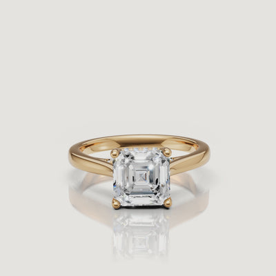 360-degree high-definition video of a Raul Diamonds Asscher cut engagement ring in 18k yellow gold featuring a hidden halo