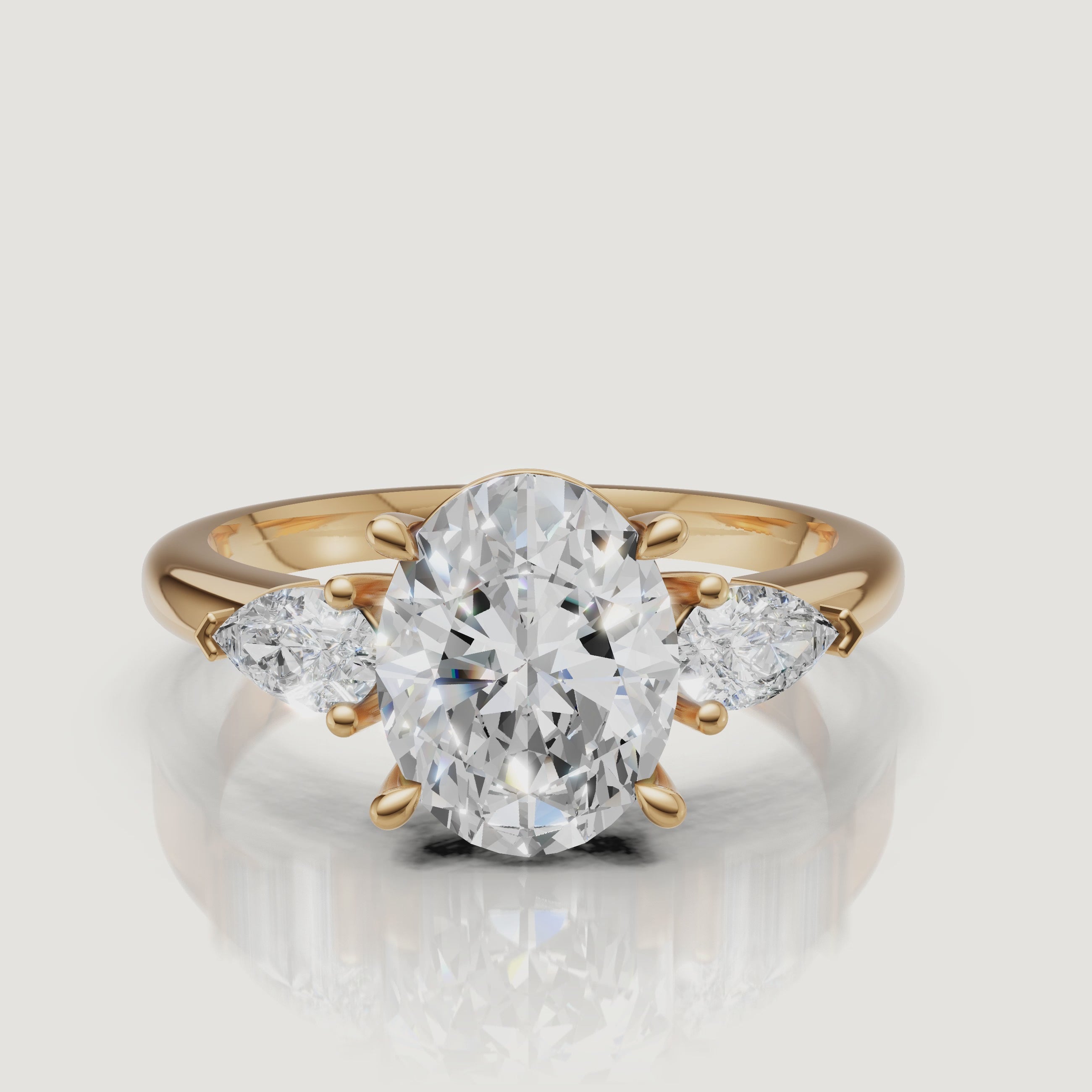 video of oval lab grown diamond engagement ring with marquise side stones in 14k yellow gold